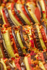 Ratatouille macro photography - vegetarian meal made from fresh sliced vegetables for healthy food and diet concept.