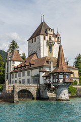 Fototapeta na wymiar Castle Oberhofen near city of Thun in Switzerland