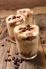 delicious tiramisu on wood background