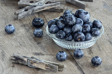 Blueberries on old wooden table