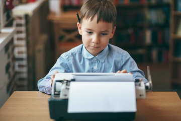 Boy with typewriter © diignat