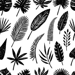 Seamless pattern of hand drawn tropical leaves and flowers.Vector illustration.