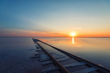 Beauty sunset on salty lake in Altay, Siberia, Russia