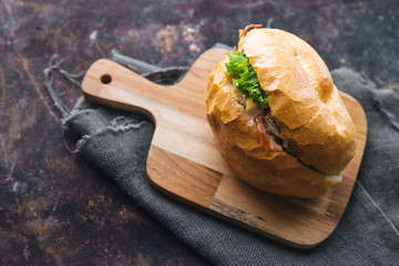 Bread with mayonnaise on rustic background