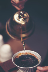 coffee dripping process, vintage filter image