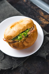 Bread with mayonnaise on rustic background
