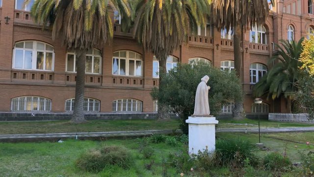 Statue in the garden of the old Asylum of the Little Sisters of the Poor located in Santiago de Chile. Convent of Nuns built in 1898.