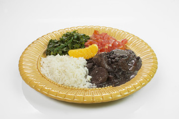 Traditional Brazilian recipe Feijoada in white background 