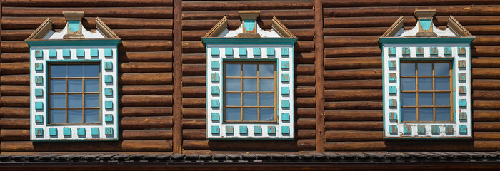 row window in the wooden wall