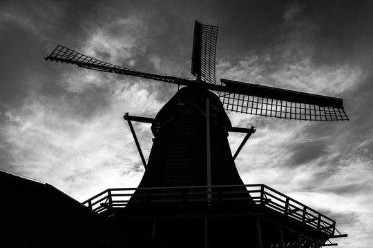 Silhuuette of a windmill hust outside Amsterdam, Netherlands at Zaanse Schans