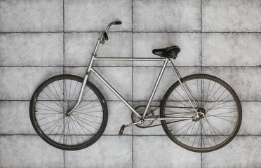 Fototapeta na wymiar old vintage bicycle on the concrete floor