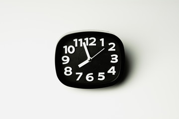 black clock isolated on white background.