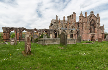 View at graveyard and ruins of Melrose abbey in Scottish borders
