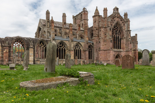 View at graveyard and ruins of Melrose abbey in Scottish borders