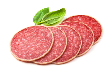 Salami with basil leaf. Smoked sausage thinly sliced, isolated on white background.
