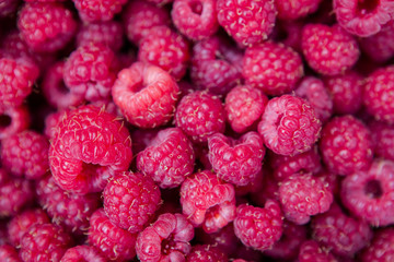Fresh raspberries background closeup photo 