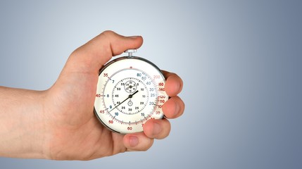 Stopwatch in Human Hand