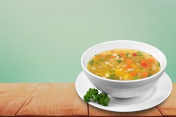 Vegetable soup on background