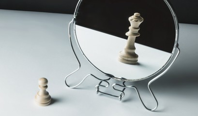 Chess Pawn Looking in the Mirror