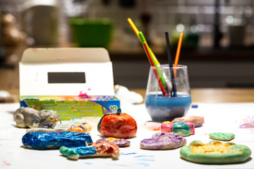 Home fun in painting cakes with salt. Creative fun of children in spare time.