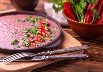 Mexican red bean puree soup with lime, parsley and chilli pepper.