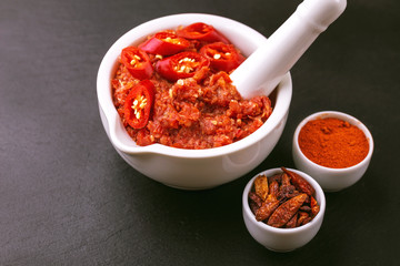 Traditional Maghrebi hot chili pepper sauce paste harissa. adjika