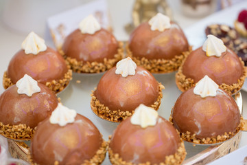 Close up of mini chocolate cakes with nuts