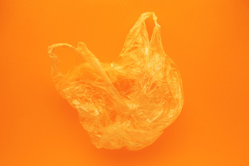 Orange plastic bag