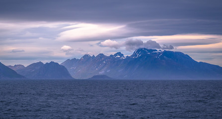 Fototapeta na wymiar Coastline of the Lofoten Islands from the ferry coming from Bodo, Norway