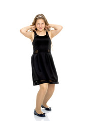 Fototapeta premium A school girl with long hair.