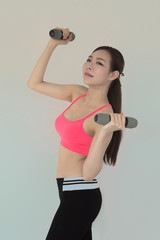 Fototapeta premium portrait of young fitness woman and .exercise