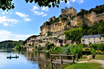 Raamstickers View of the beautiful village of Beynac et Cazenac with river reflections Dordogne, France © Jenifoto