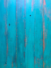 Above view of  turquoise green wood planks