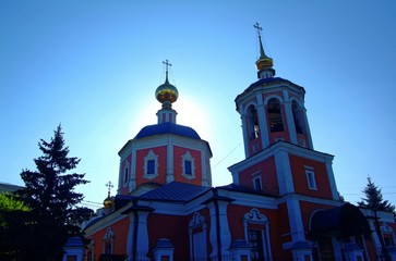 Fototapeta na wymiar the Orthodox Church against the blue sky