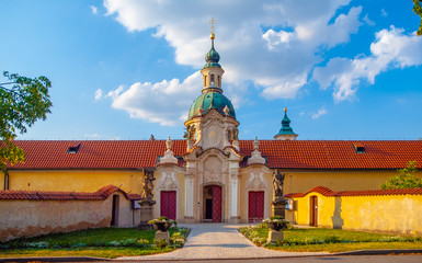 Fototapeta na wymiar Baroque Church of Our Lady Victorious at Bila Hora in Venio Abbey - Benedictine Monastery, Prague, Czech Republic.