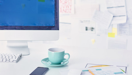 A cup of coffee on the office table