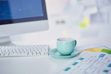 A cup of coffee on the office table