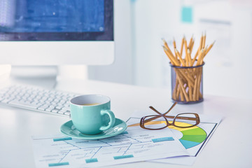 A cup of coffee on the office table