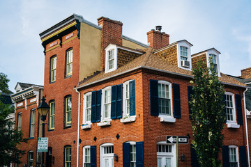 Fototapeta na wymiar Historic brick row houses in Fells Point, Baltimore, Maryland