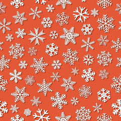 Christmas seamless pattern of snowflakes with shadows, white on orange background