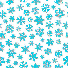 Christmas seamless pattern of snowflakes, light blue on white background