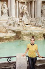 Naklejka premium Portrait of happy stylish woman in yellow blouse in Rome, Italy