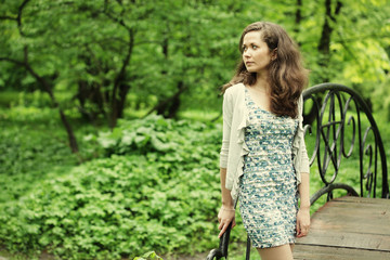 Beautiful young woman in garden