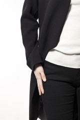 woman wearing black coat isolated white.