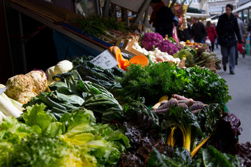 Heaps of healthy food and vegetables like spinach and lettuce on the local organic farmers market