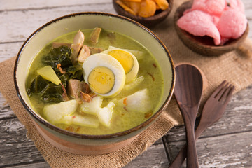 lontong sayur. rice cake with soup