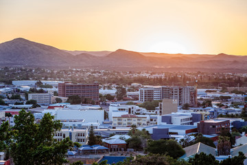 Sunset over Windhoek central business district and mountains in