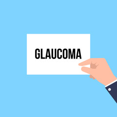 Man showing paper GLAUCOMA text