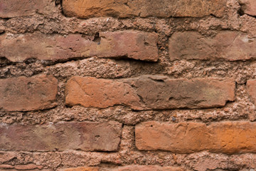 construction of wall with texture of very old red bricks