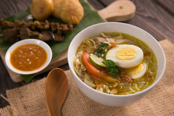 soto ayam. shreedded chicken soup
